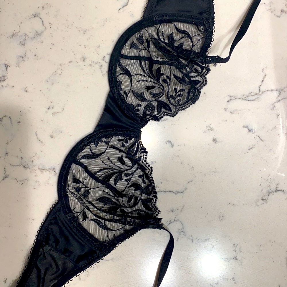 Black lace underwire bra.
